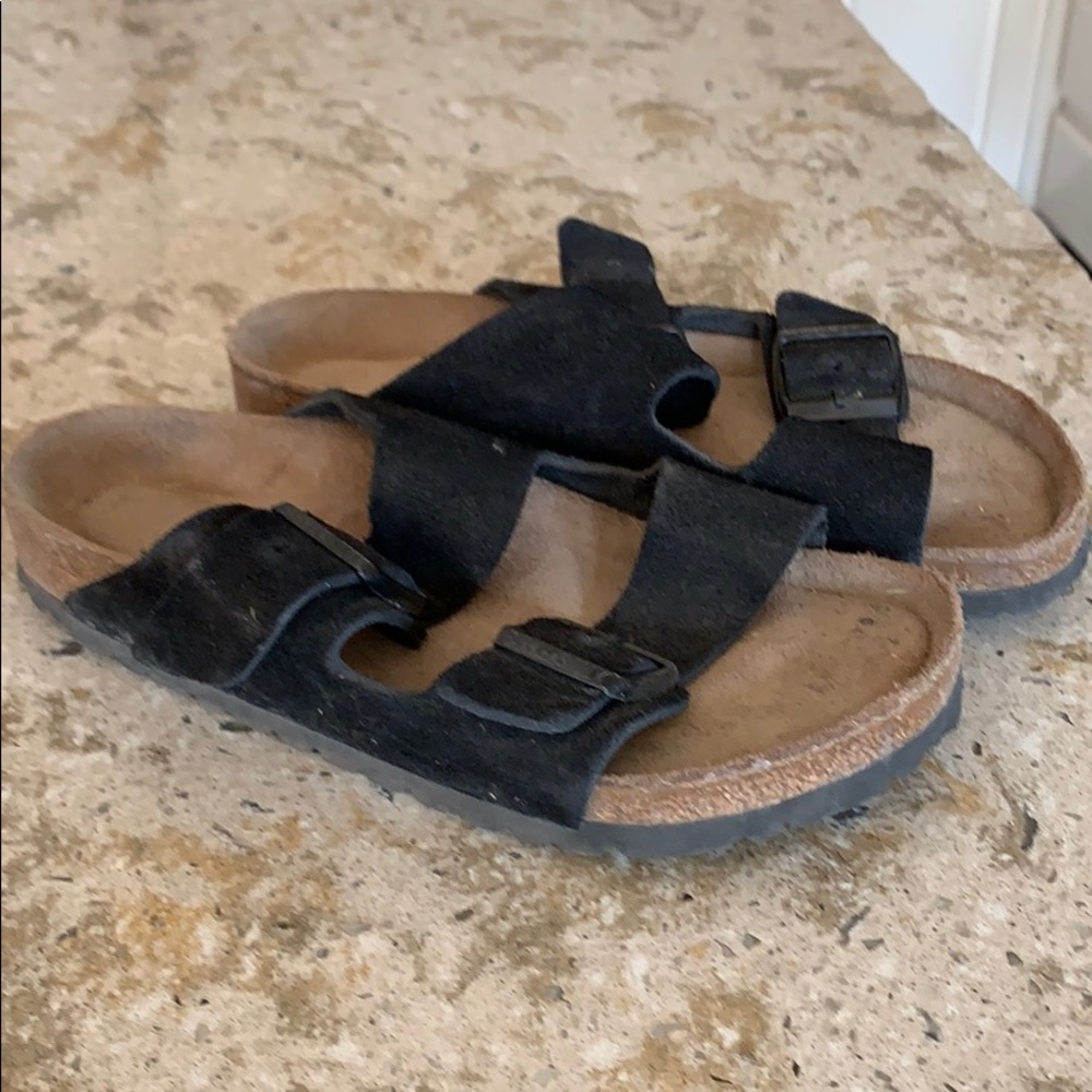 Black suede Birkenstock’s
